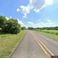 Hay bales blocking roadway on FM 1602