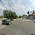 Driver reported running red light at Broad and Bay