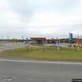 Two-vehicle crash with person trapped near truck stop