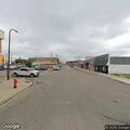 Person found lying wrapped in blanket behind business