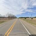 Man pulling down pants in roadway on US 82