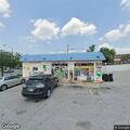 Woman damages store equipment with metal stick