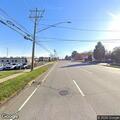 Traffic stop of black Nissan Frontier at intersection