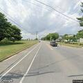 Traffic stop on red and white dump truck