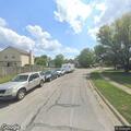 Person folded over near disabled vehicle in Columbus