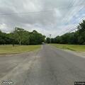 Green dirt bike entering Wharton State Forest