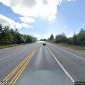Injury crash with car in ditch on WA-305 ramp