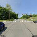 Man walking in street at William Flynn Highway and Dickey Road