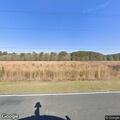 Tree limb blocking lane on US 74 near Harleysville Road