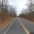 Driver in red pickup tries to hit woman on roadside