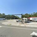 Person experiencing chest pain at highway location