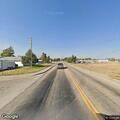 Overturned box truck with hazardous load on WY-151