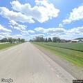 Man runs through field, nearly hits resident
