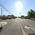 Two-car crash damages sign and fence on Spring Street