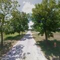 Tree blocking road near Highway 97 on (number withheld) P Road
