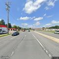 Woman swinging arms on corner checked by welfare officers