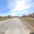 Two vehicles stopped on I-41 right shoulder