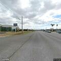 Pedestrian standing in roadway at Sparkman and University