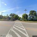 Person having allergic reaction in white Nissan on Belvidere Road