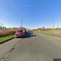 Person with laceration in vehicle on Industrial Avenue