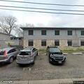 Officer meeting caller at Elm Street apartment