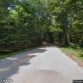 Tree blocking roadway on Omena Point Road