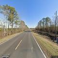 Truck overturns after hitting tree on NC Highway 53