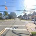 Chemical drum leaking in roadway on Milford Avenue