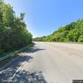 Vehicle towing double wide creating road hazard
