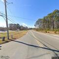 Person walking in middle of road on Mary Ball Rd