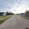 Loose brown dog reported in neighborhood