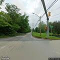 Dump truck caught under utility pole on Butler Pike