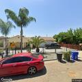 Cat complaint in front of Orange Cove residence
