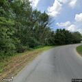 Truck flips into woods on Spurgeon Road curve