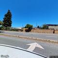 Bicyclist riding on freeway shoulder near El Portal