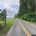 Tree debris partially blocking Bowersox Road
