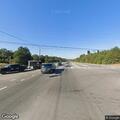Traffic check on white sedan after crash