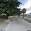 Man with facial and hand cuts lying in street in Hialeah
