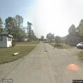 Person experiencing abdominal pain at Marble Hill Drive