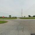 Woman having difficulty breathing on highway side