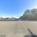 Two-vehicle crash blocking roadway at intersection