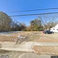 Large water leak in street near Dabney Drive store