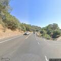 Vehicle with flat tire blocking lane on Highway 49
