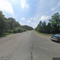 Car and motorcycle crash at Long Island Avenue