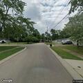 Person experiencing abdominal pain in Northbrook