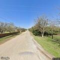 Loose longhorns running across Calder Road