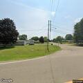 Motorcycle crash with rider in ditch in Canton