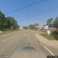 Officers detain person near Grand River and Love