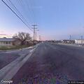 Trash can fire in alley behind business