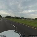 Suspicious bicyclist riding wrong way near exit ramp